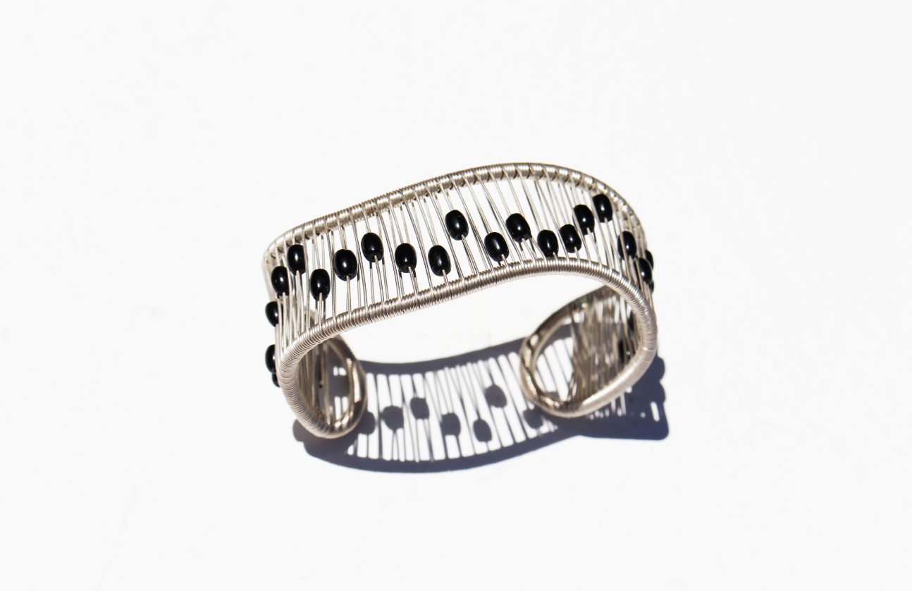 Tana Acton, Silver Movable Mobius Cuff with Kinetic Black Beads