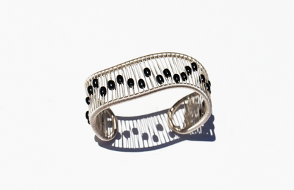 Tana Acton, Silver Movable Mobius Cuff with Kinetic Black Beads